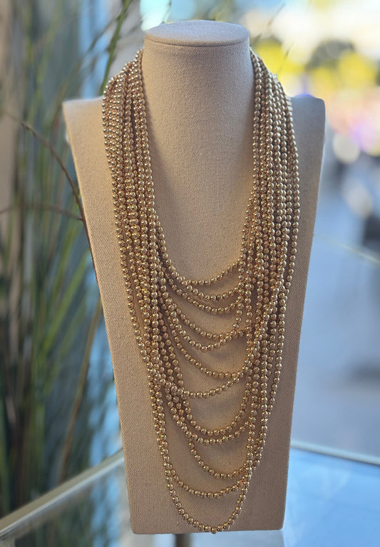 Collar perlas doradas