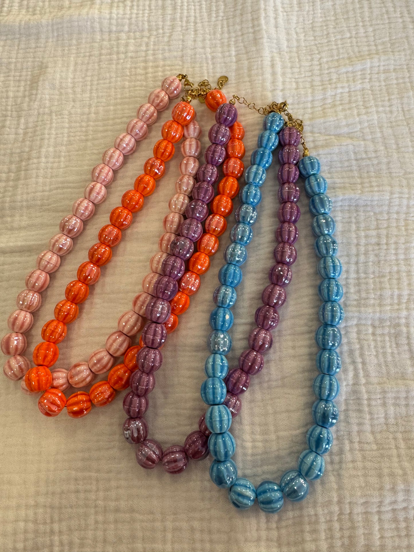collar bolas naranja